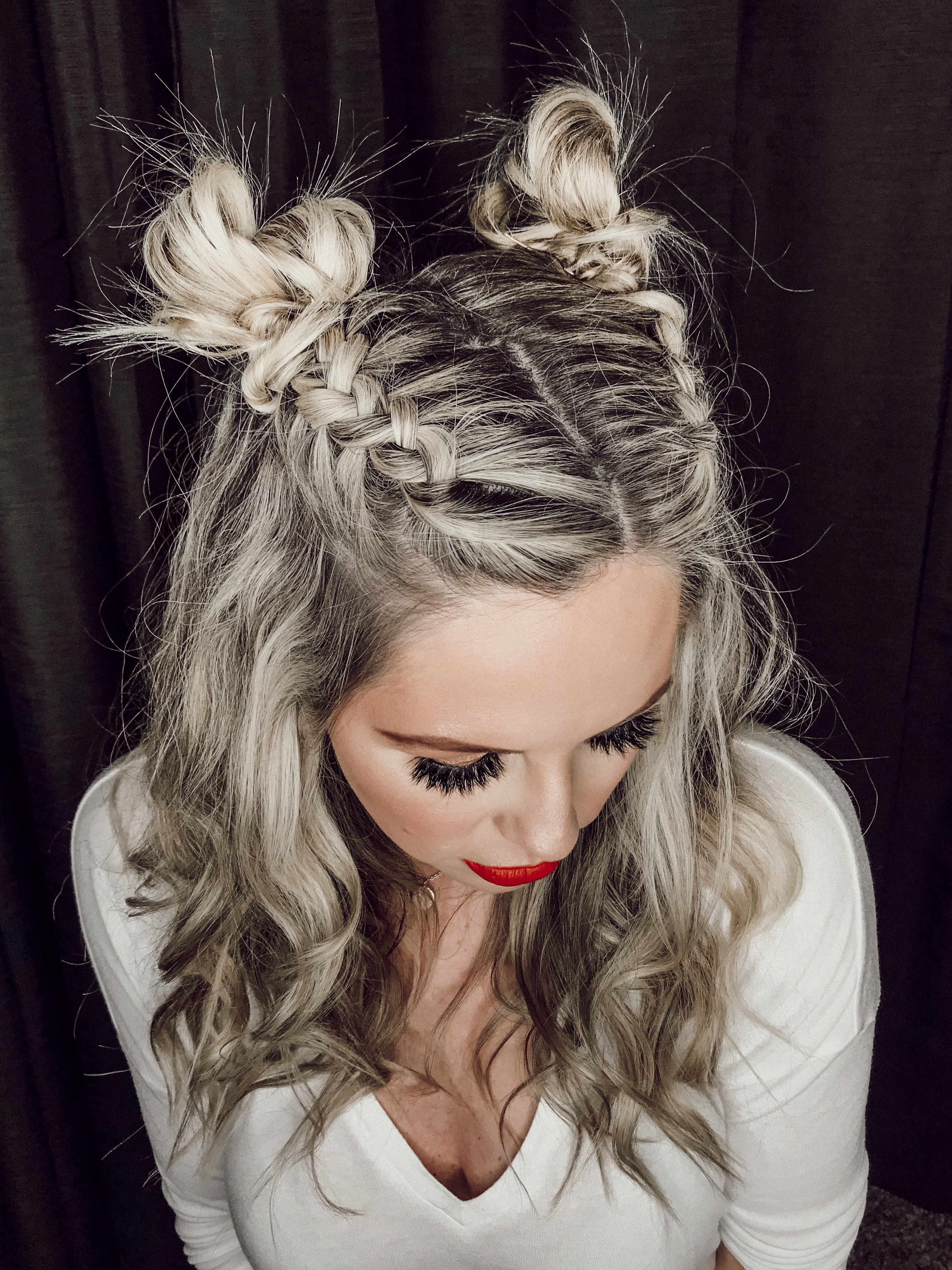 New Years Eve Style Guide featured by top Nashville life and style blog, Nashville Wifestyles. Your Complete New Years Eve Style Guide: Hair, Makeup, Outfits & Party Ideas - Nashville Wifestyles; I’m loving these double dutch pigtail braids buns by my friend Courtney. It’s so fun and versatile that you can rock it during the holidays or two days long like I did even to run errands ha. She’s giving a step by step on my YouTube channel for you. with New Years comes more makeup looks, parties and recipes. NYE is the ideal time to be as EXTRA as you wanna be. Amp up your New Years Eve style and wear the sparkles, wear the red lip and the smoky eye, rock the glitter and big hair.