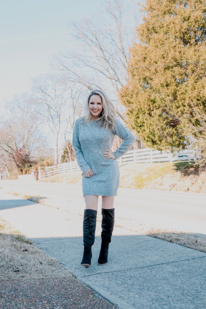 Holiday Looks With VICI - Nashville Wifestyles; Who else is covered up in holiday parties? I mean even if I'm not I just throw on a sequin dress for the heck of it because the holidays are my ABSOLUTE favorite. Between the work parties, family parties and your friend's Christmas gatherings VICI has you covered on your snazzy outfit needs. They keep dropping new collections and with each one I become more and more obsessed. ALSO these looks are perfect for New Years. Use my code ASHLEYH20 to get 20% off! Click for the looks! | Holiday Looks With VICI Fashion by popular Nashville fashion blog, Nashville Wifestyles: image of a woman wearing a Vici BAG OF TRICKS EMBELLISHED SWEATER DRESS and DAWN FAUX SUEDE HEELED BOOT.