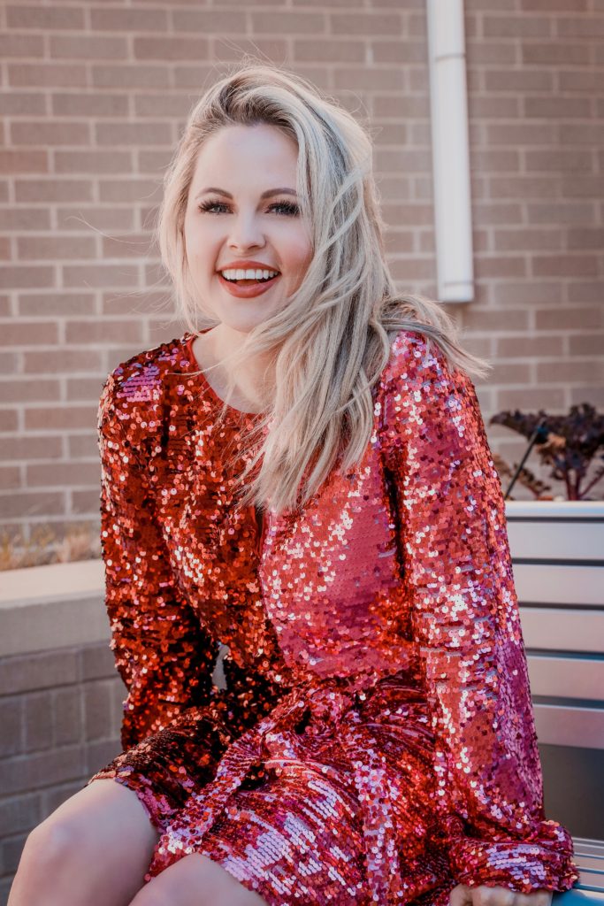 Holiday Looks With VICI - Nashville Wifestyles; Who else is covered up in holiday parties? I mean even if I'm not I just throw on a sequin dress for the heck of it because the holidays are my ABSOLUTE favorite. Between the work parties, family parties and your friend's Christmas gatherings VICI has you covered on your snazzy outfit needs. They keep dropping new collections and with each one I become more and more obsessed. ALSO these looks are perfect for New Years. Use my code ASHLEYH20 to get 20% off! Click for the looks! | Holiday Looks With VICI Fashion by popular Nashville fashion blog, Nashville Wifestyles: image of a woman wearing a Vici SET YOUR SIGHTS SEQUIN TWO-TONE DRESS.