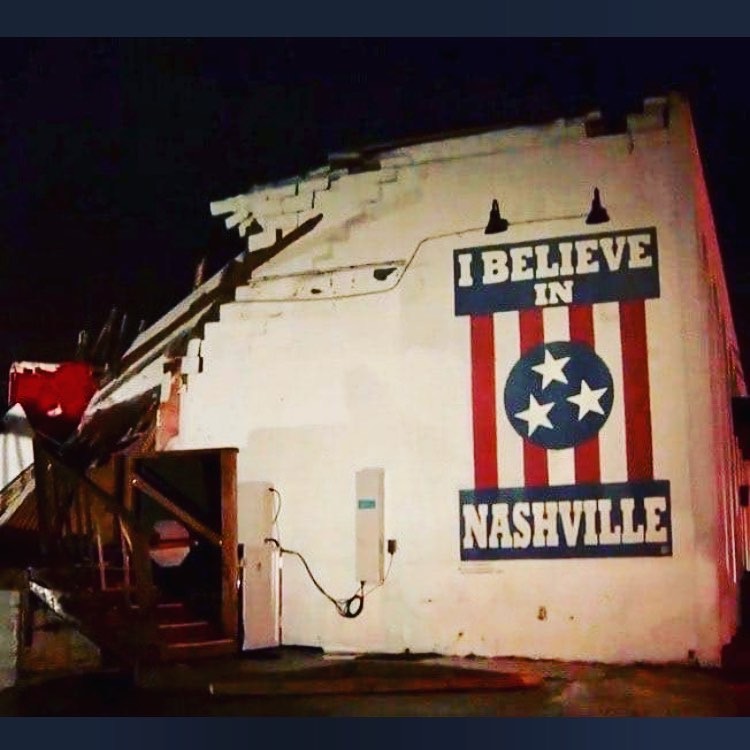Nashville Tornadoes: How to Help the Victims & the City Of Nashville: info featured by top Nashville blog, Nashville Wifestyles. | Tornado Victims by popular Nashville lifestyle blog, Nashville Wifestyles: image of a destroyed building with a 'I Believe in Nashville' mural on it.