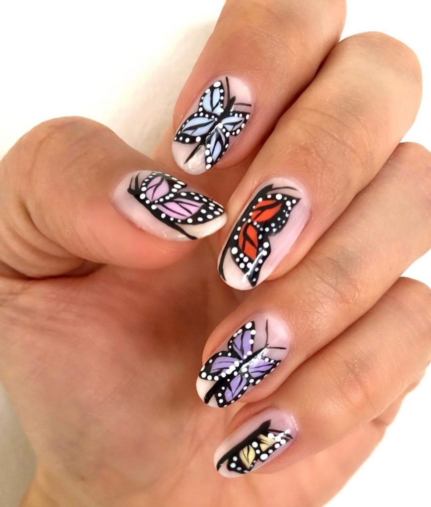 Bright Summer Nails by popular Nashville beauty blog, Nashville Wifestyles: image of butterfly nails. 