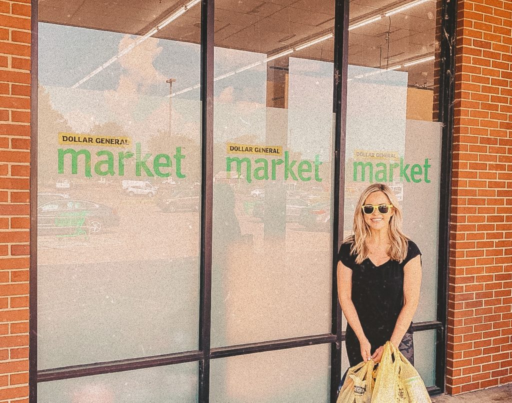 Back to School Tips by popular Nashville lifestyle blog, Nashville Wifestyles: image of a woman standing outside of a Dollar General market. 