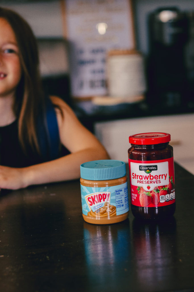 Back to School Tips by popular Nashville lifestyle blog, Nashville Wifestyles: image of Dollar General Skippy peanut butter, and Dollar General strawberry jam. 