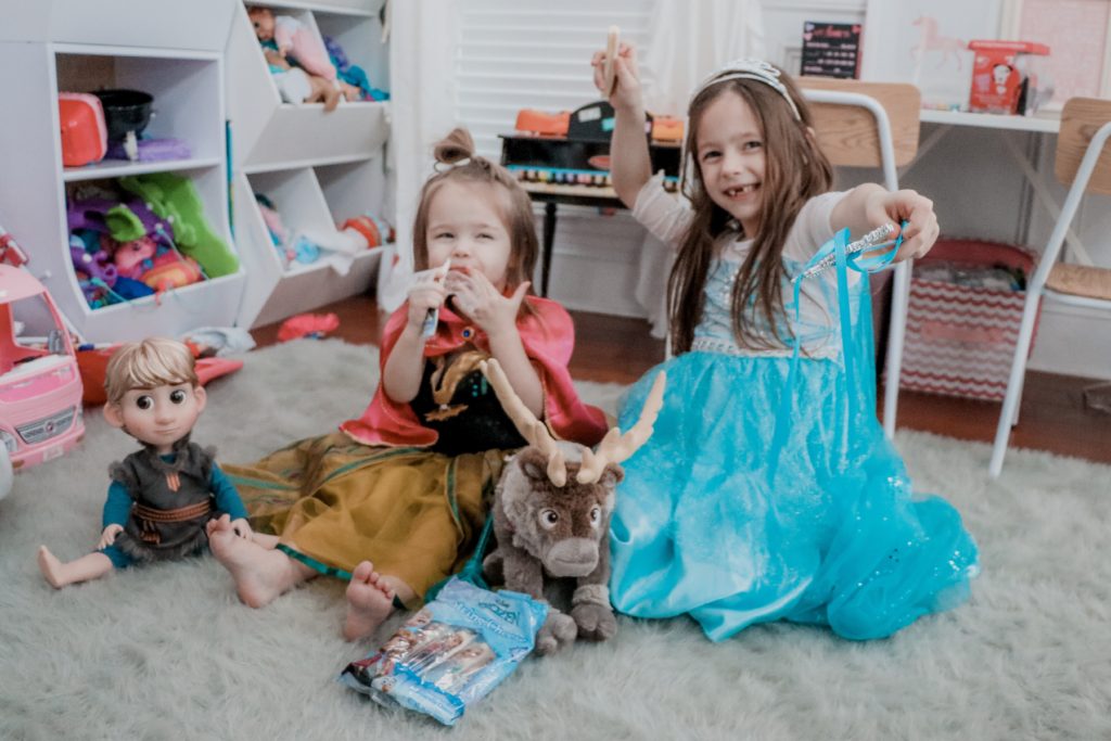 Things to do in the Summer by popular Nashville lifestyle blog, Nashville Wifestyles: image of two young girls wearing Frozen costumes. 
