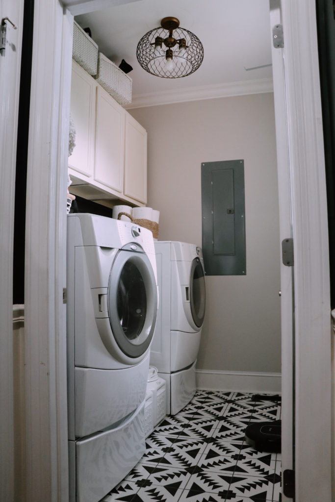 Laundry Room Remodel by popular Nashville life and style blog, Nashville Wifestyles: image of a remodeled laundry room with Floor and Decor black and white tile. 