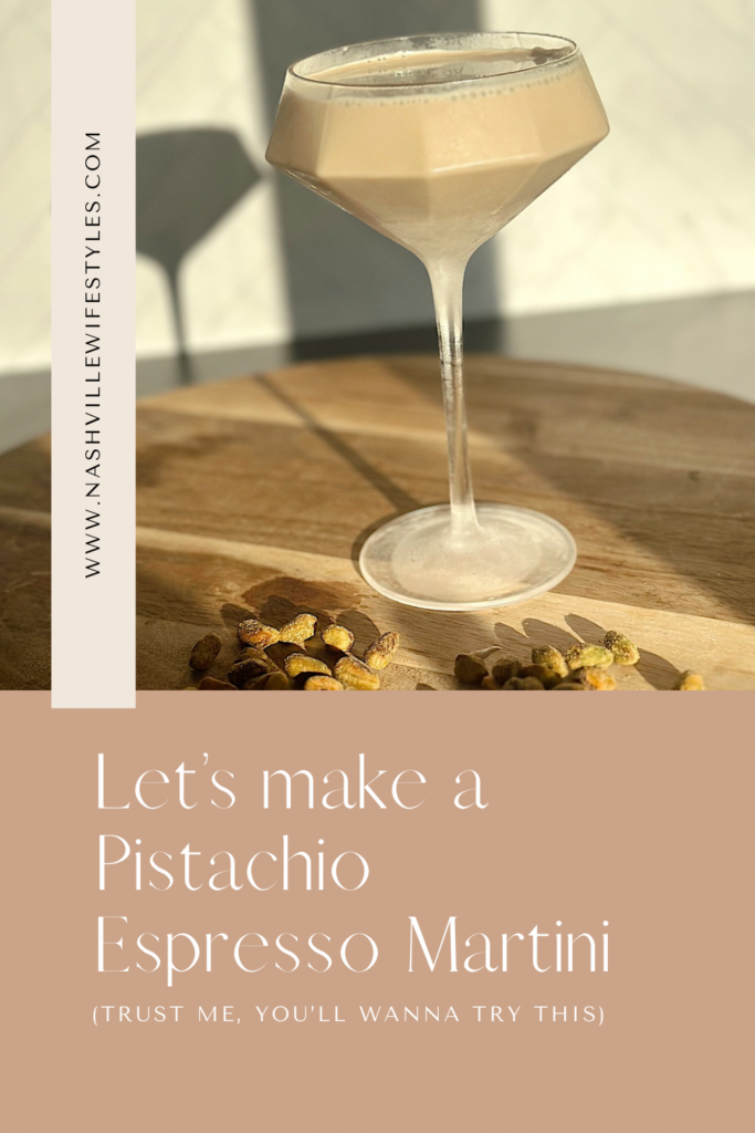 Pistachio Espresso Martini topped with crushed pistachios in a chilled martini glass, creamy coffee cocktail on marble surface with coffee beans and gold shaker nearby